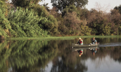 Photo of two canoes on the San Joaquin River near Fresno