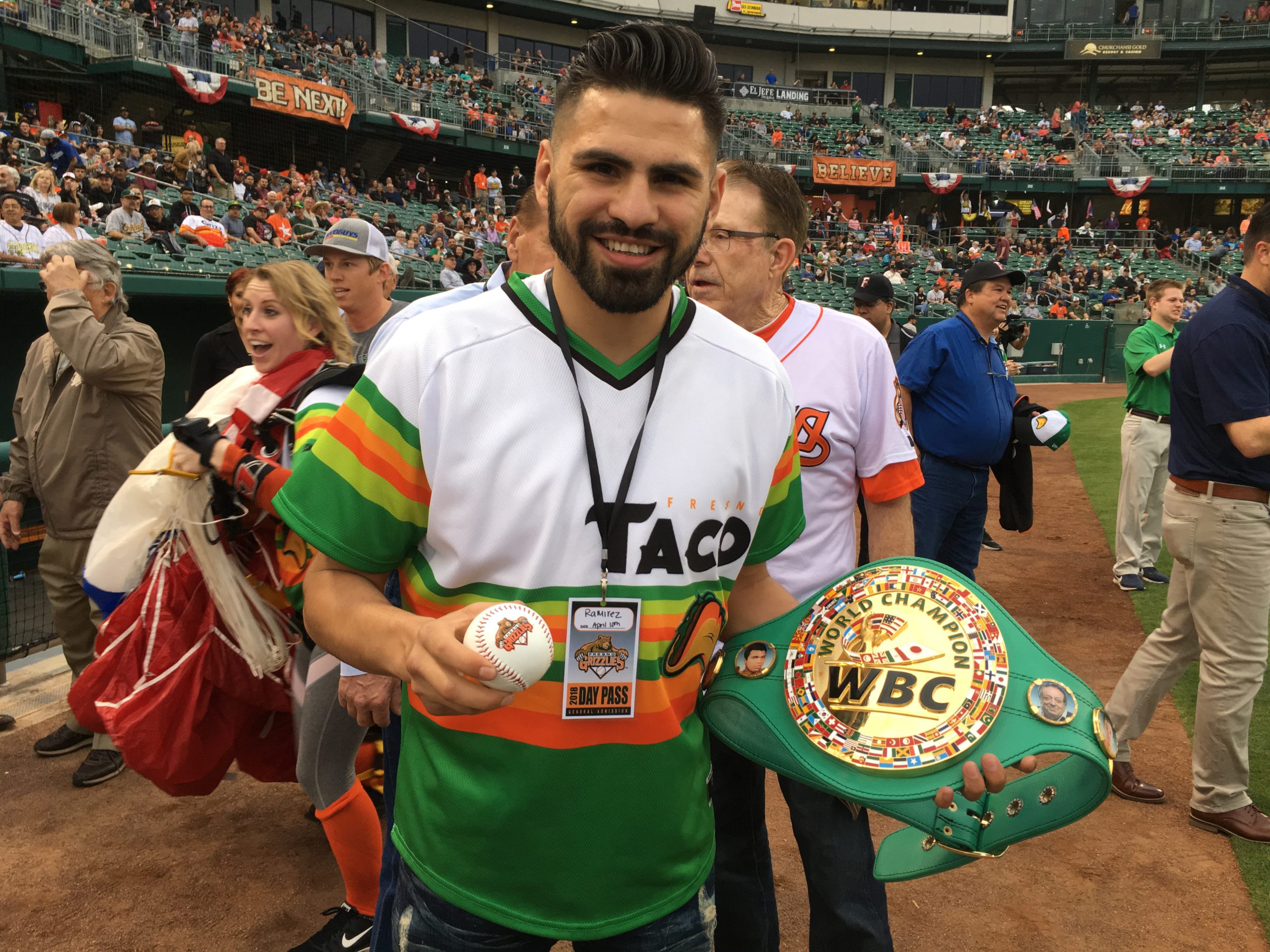 Photo of world boxing champion Jose Ramirez with his title belt