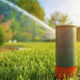 Home lawn sprinkler spraying water