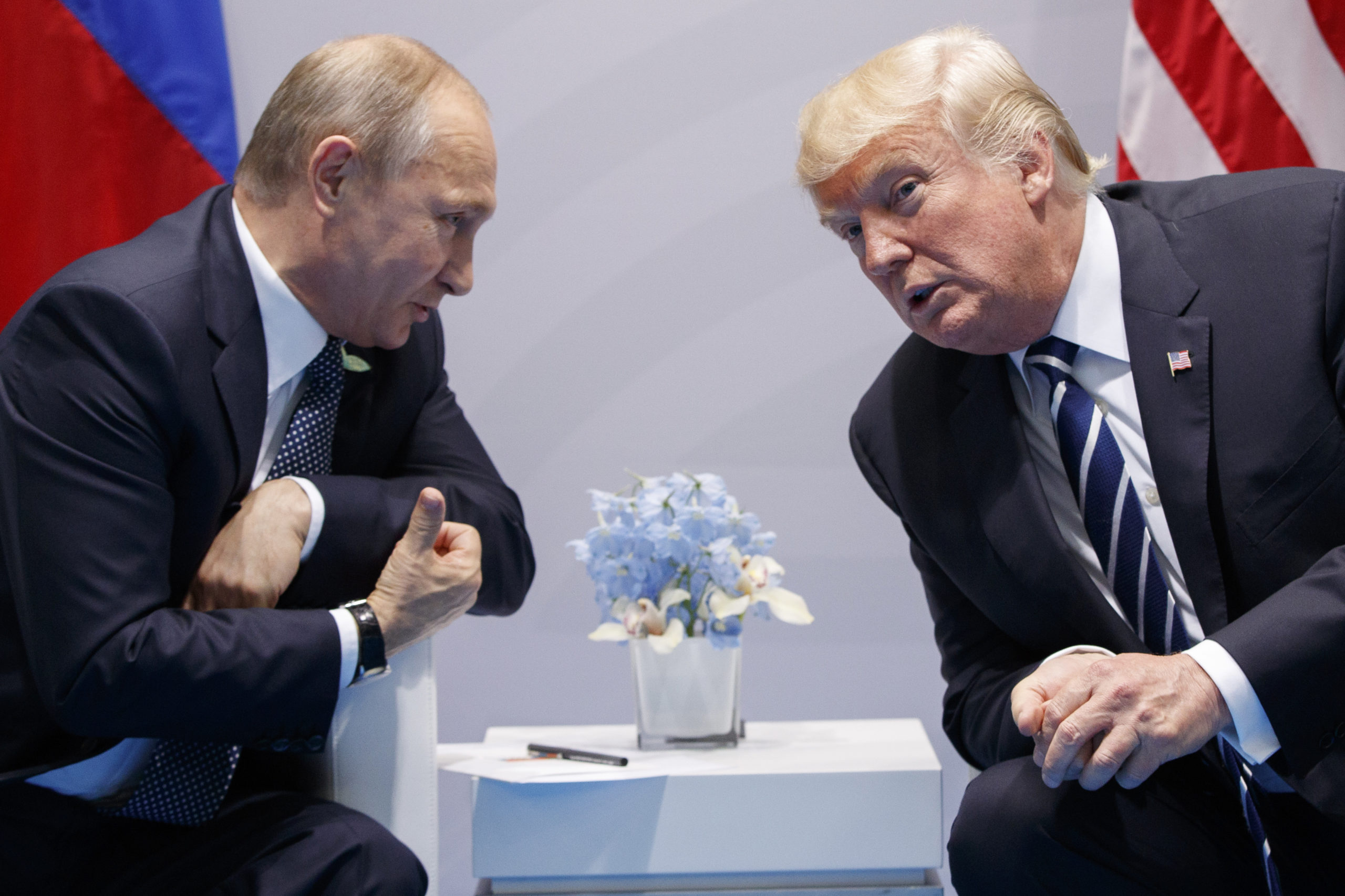 AP picture of Vladimir Putin, left, and Donald Trump