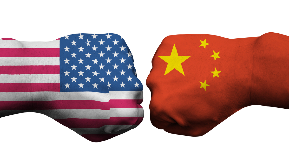 Boxing gloves featuring U.S., left, and China flags