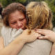 Photo of grieving Bledoe sisters