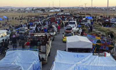 Photo of people fleeing Syria