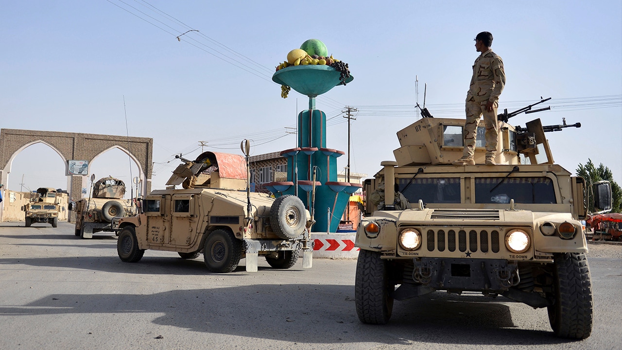 Photo of Afghan security personnel patrol in the city of Ghazni province