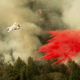Photo of air tanker dropping flame retardant on the Ferguson Fire