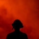 A firefighter keeps an eye on the Holy Fire in southern California.