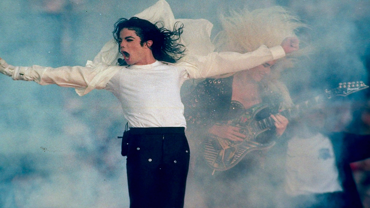 Photo of Michael Jackson performing at Super Bowl XXVII