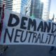 Photo of protestors advocating for net neutrality