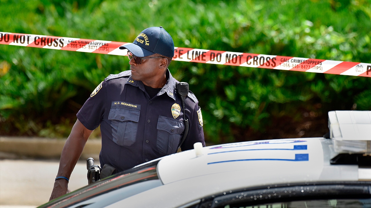 Photo of police investigating a shooting during a Madden Championship Tournament in Jacksonville Landing