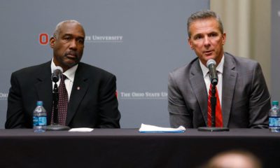 Photo of Urban Meyer answering questions during a news conference in Ohio