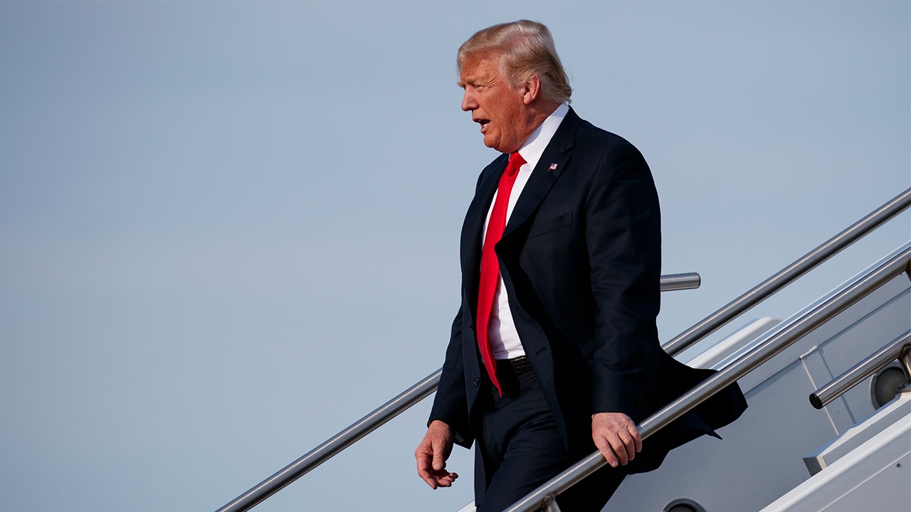 Photo of President Donald Trump walking off Air Force One