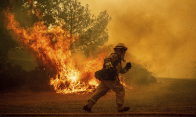 Photo of a running California firefighter