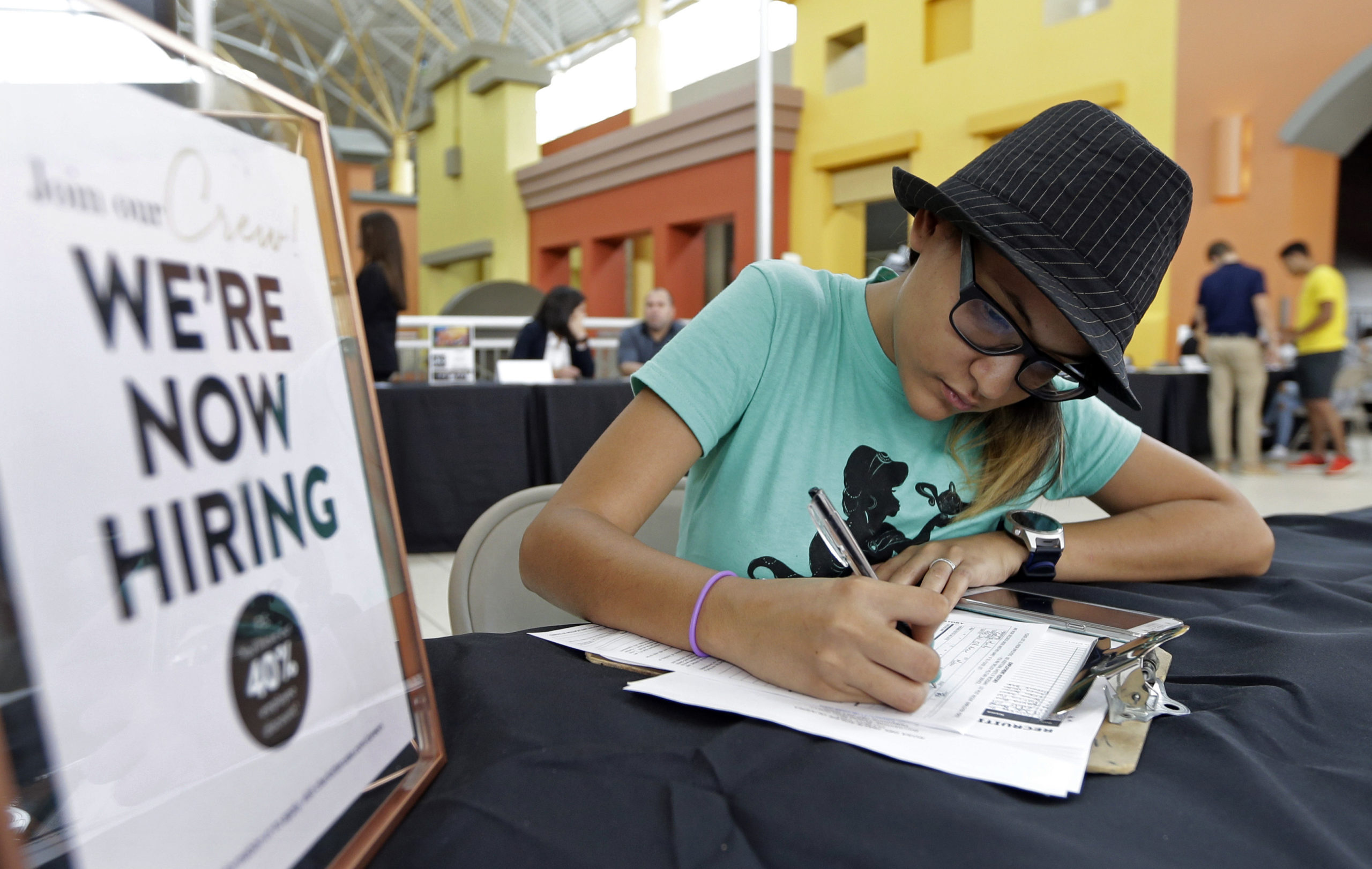 Photo of a job seeker filling out an application