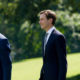 Photo of Jared Kushner walking on lawn