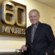Photo of Jeff Fager posing at the 60 Minutes office in New York