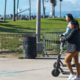 Photo of two girls riding motorized scooters in Venice