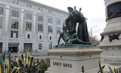 Photo of "Early Days" - a statue that depicts a Native American at the feet of a Spanish cowboy and Catholic missionary in San Francisco.