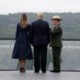 President Donald Trump and first lady Melania Trump walking along the September 11th Flight 93 memorial