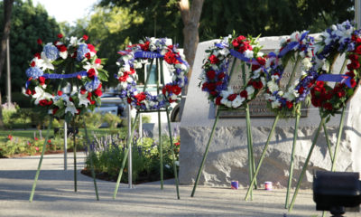 Photo of wreaths and memorial marker in Clovis, California, commemorating the 9-11 terrorist attacks