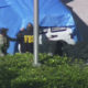 Photo of agents covering a van