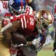 Photo of San Francisco 49ers running back Matt Breida being tackled