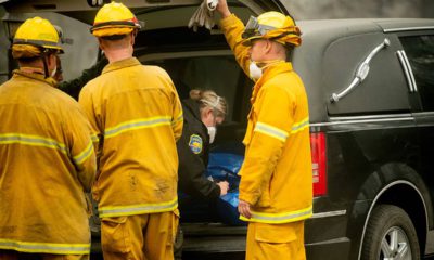 Photo of Butte County sheriff's deputy making a note