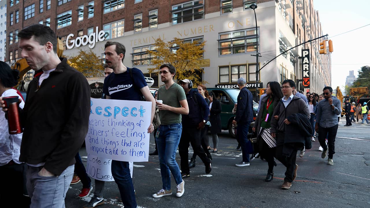 Photo of Google employees walking off the job in protest