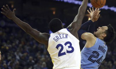 Photo of Memphis Grizzlies' Dillon Brooks and Golden State Warriors' Draymond Green