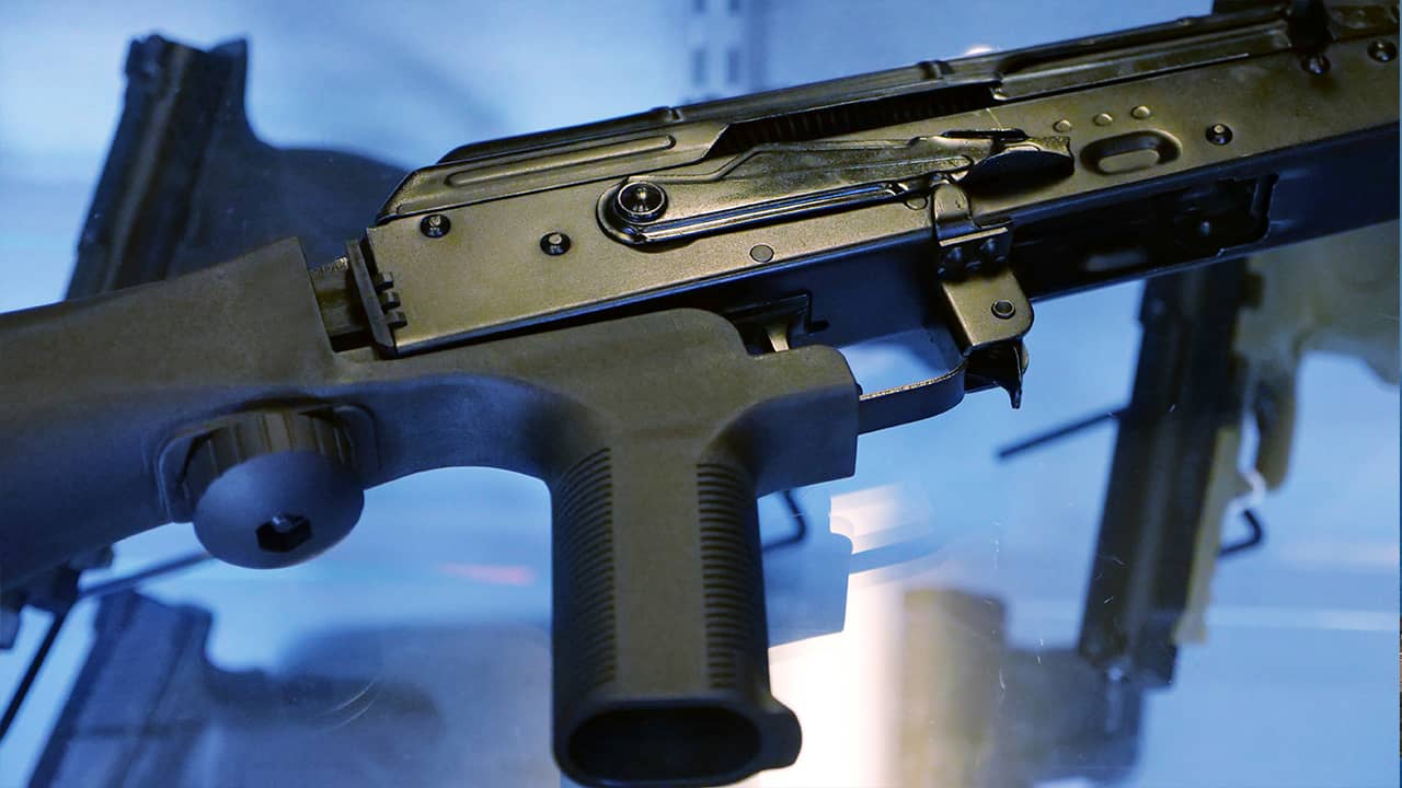 Photo of a bump stock attached to a semi-automatic rifle