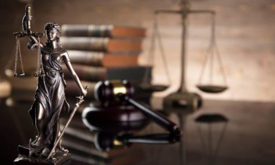 Photo of the statue of justice and books
