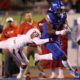 Photo of a Fresno State player tackling a Boise State player
