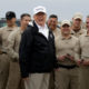 Photo of President Trump with customs and border agents