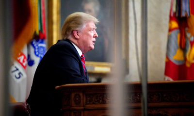Photo of President Donald Trump talking to the nation from the Oval Office.