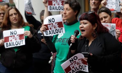 Photo of protesters before a California Public Utilities Commission meeting in San Francisco