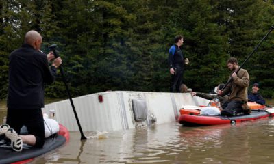 Photo of a submerged RV in the flood waters of the Russian River