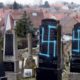 Photo of gravestones vandalized with swastikas