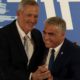 Photo of Benny Gantz, left, smiles with Yair Lapid