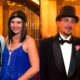 Photo of party-goers dressed in Gatsby era clothing