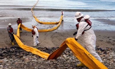 Photo of oil containment workers