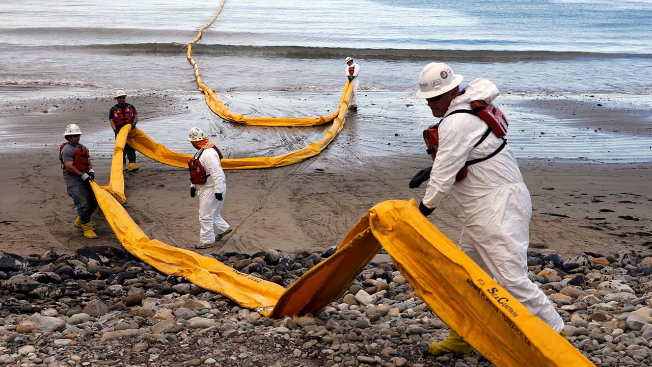 Photo of oil containment workers