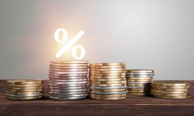 Photo of coins and % sign