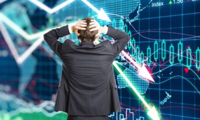 Composite photo of a worried investor starting at market returns