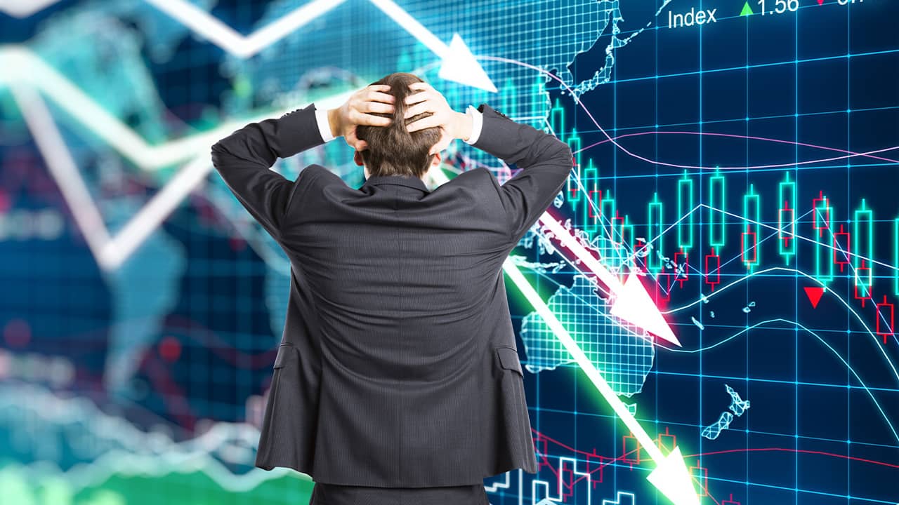 Composite photo of a worried investor starting at market returns