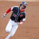 Photo of Fresno State catcher Carter Bins rounding the bases
