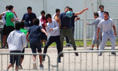Photo of immigrant children playing soccer
