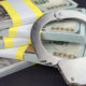 Photo of handcuffs and $100 bills