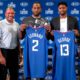 Photo of Kawhi Leonard, center, and Paul George, second right, holding their new team jerseys, with Los Angeles Clippers President of Basketball Operations Lawrence Frank, left, head coach Doc Rivers, second left, and team chairman Steve Ballmer