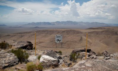 Photo of signs near the crest of Yucca Mountain in Mercury, Nv.