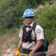 Photo of Forest Service district ranger Matthew Zumstein out in the field