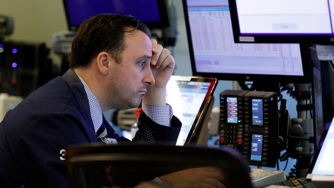 Photo of trader Brandon Barb working on the floor of the stock market